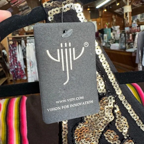 Elegant Black and Gold Embellished Dress - Picture 5 of 13